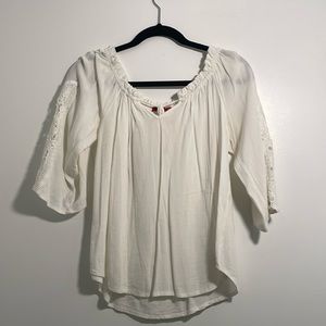 White blouse with sleeve lace detailing